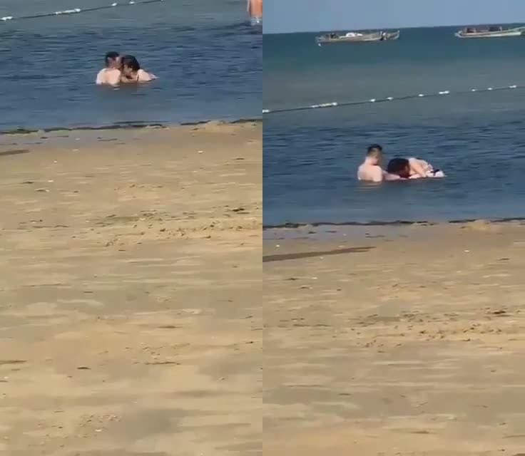 海滩寻求刺激的情侣，公然在浅滩撒狗粮，亲嘴就算了，还掏出鸡巴让女友含进去，看呐口活口活，小孩都走近靠前看乐！